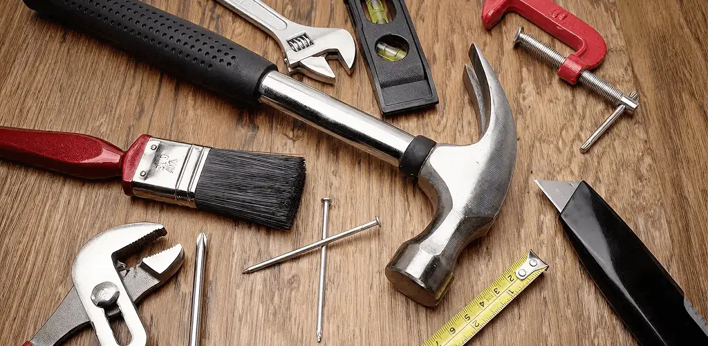 Handyman tools laid out for home repair and maintenance work in Tuscaloosa, AL